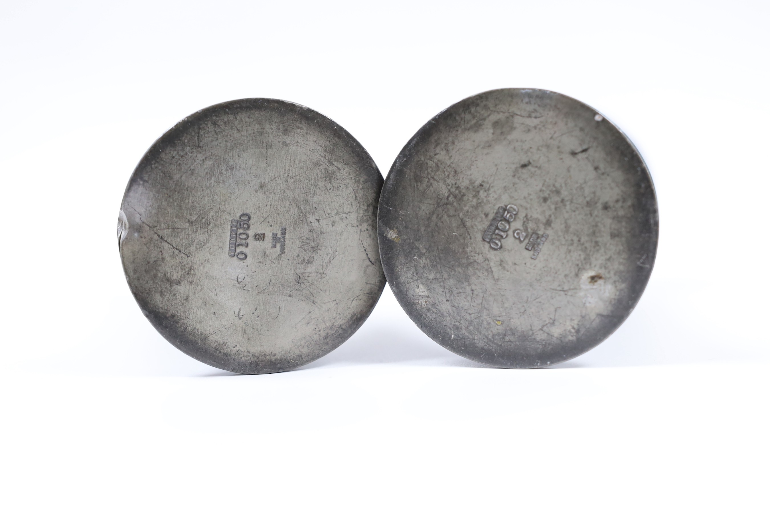 A pair of Liberty's Tudric pewter posy vases, 16cm tall